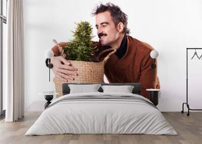 A man hugging a cannabis plant with white background Wall mural