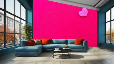 Pink heart shape on pink background Wall mural