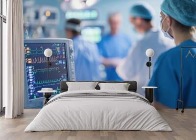 Medical professionals monitor a patient in an operating room, utilizing advanced technology and teamwork in a critical healthcare setting. Wall mural