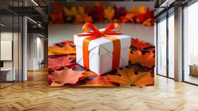 two packages tied with a ribbon and leaves around from fall, (24) Wall mural