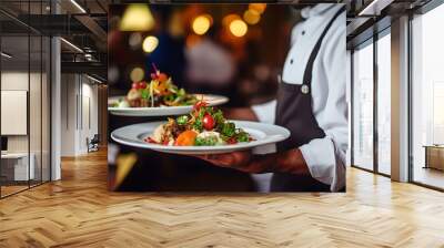 waiter carrying plates with meat and vegetables dish in restaurant , celebration event ,Restaurant serving , wedding , festive event, party ,blur background, . Close Up of food stylish Wall mural