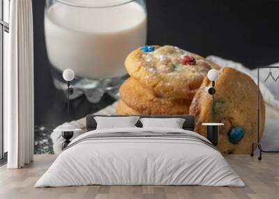 Homemade M&Ms cookies served with a glass of milk Wall mural