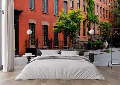 Beautiful buildings in Greenwich Village, Soho district. Entrance doors with stairs and trees, Manhattan New York. Classic luxury apartment building in New York City. Beautiful american street. Wall mural