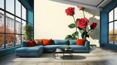 Bouquet of red roses casting shadows on beige background with copy space for design and decoration Wall mural