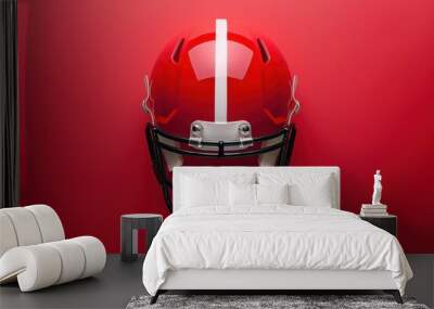 Red football helmet on a contrasting background with a sleek design and glossy finish Wall mural