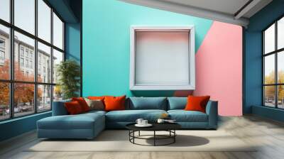 Simple white frame on pastel background of turquoise and pink Wall mural