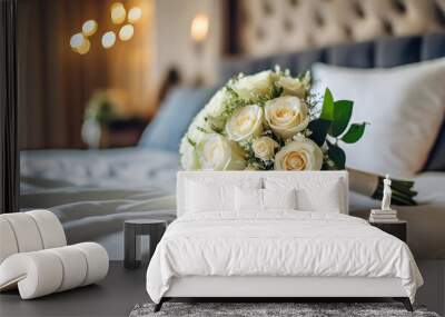 bouquet of white roses on bed, young couple in love blurred in background Wall mural