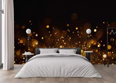 gold sparkle stars burst against a black backdrop, creating a mesmerizing bokeh glitter explosion. Golden particles dance in a magical display Wall mural