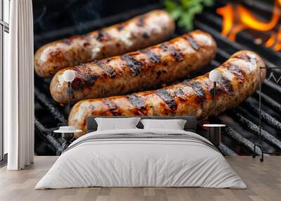 Hot, tasty grilled sausages sizzling on a charcoal grill with smoke rising, evoking a sense of warmth, outdoor cooking, and the rich, savory aroma of perfectly cooked meat Wall mural