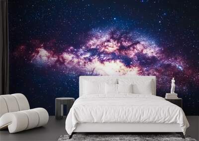 starry night sky, showcasing a vast galaxy filled with twinkling stars. The cosmic landscape captures the endless mysteries of the universe Wall mural