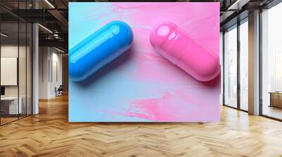 Two vibrant medicine capsules in contrasting colors are placed against a neutral background. The image represents modern healthcare, pharmaceutical science, and the complex role of medication in treat Wall mural