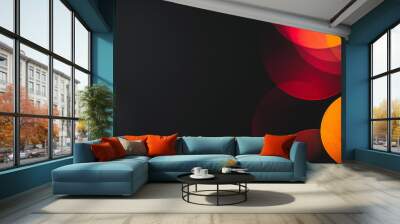 Warm red and orange bokeh circles overlap on a black background creating a vibrant and festive abstract pattern with a soft glowing effect Wall mural