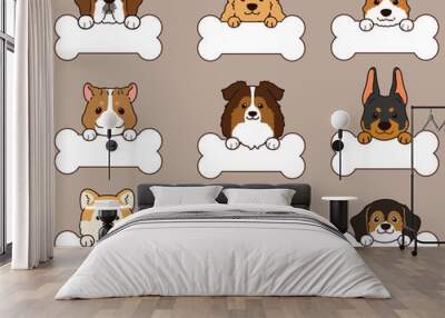 Set of outlined cute and simple dog heads with front paws holding a bone Wall mural