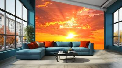 A breathtaking sunrise illuminates the sky with warm hues of orange, pink, and gold. The calm waters of the ocean reflect the vibrant colors, Wall mural