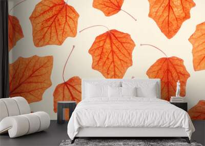 Autumn poplar leaves on beige background.  Minimal monochrome pattern with fallen autumn leaves, orange yellow colored textured foliage, autumnal herbarium. Nature flat lay with fall leaf Wall mural