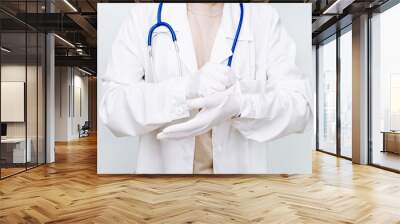 Medicine doctor close up in white coat wear gloves. Healthcare and medical concept. Wall mural