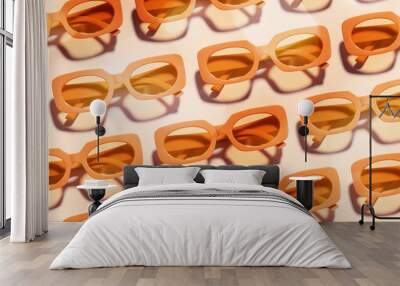 Pattern of Trendy sunglasses with Yellow orange  Frame on peach color,  beach vibes, summertime mood, sunlight shadow, color gradient. Summer vacation concept Minimal banner of eyeglasses Wall mural