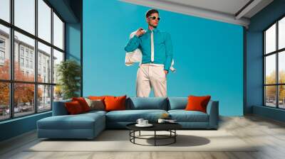 Retro fifties summer fashion man with white suit and sunglasses. Wall mural