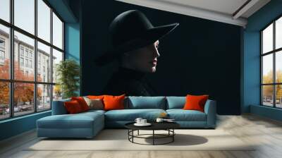 Vintage 1940s woman in black hat. Side view. Wall mural