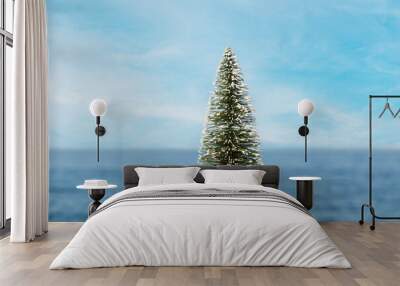 Christmas tree on the sea, Christmas holidays, travel tours as a gift for Christmas Wall mural