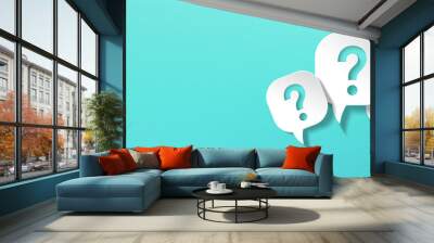 Question mark with speech bubble on blue background Wall mural