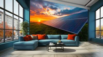 A stunning sunset illuminates solar panels in a green field, showcasing the beauty of renewable energy and nature. Wall mural