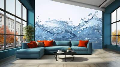 Captivating splash of water droplets creating dynamic ripples, showcasing the beauty and fluidity of nature's element. Wall mural