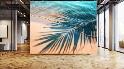 Shadow of tropical palm tree over a white sand beach seashore, summer holiday concept Wall mural