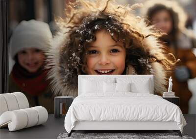 a cheerful young girl wearing warm fur clothing smiles brightly in the winter season Wall mural