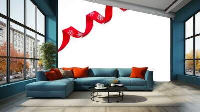 A red curling bright ribbon with snowflakes on a white background. Copy space. The concept of Christmas, St Valentine Day and gifts Wall mural