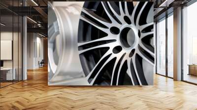 alloy wheels in wheel shop.Wheel rims on showcase. Car alloy wheels at a wheel shop or automobile exhibition.Stand with alloy wheels in modern tire store.SElrctive focus Wall mural