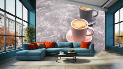 Two cups of coffee on grey background. Copy space. Wall mural