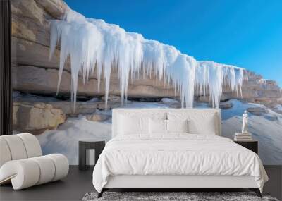 Majestic frozen waterfall in winter landscape for nature and adventure themes Wall mural