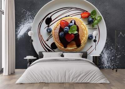 pancakes with berries on a white plate Wall mural