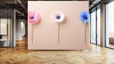 Pastel gerbera daisies in pink, white, and blue on minimalist background Wall mural