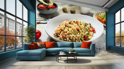 vegetarian and vegan dish bulgur tabbouleh with pepper and herbs Wall mural