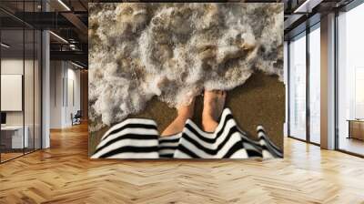 Beach. Picture of a happy women-foot on a beautiful golden sand. Wall mural