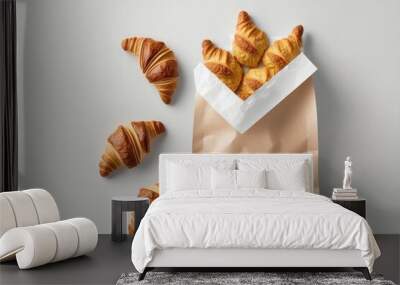 Paper bag with croissants on white background. Space for design. AI generated Wall mural