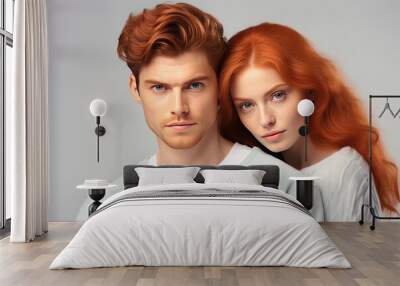 Portrait of beautiful redhead couple isolated on grey studio background. AI generated Wall mural