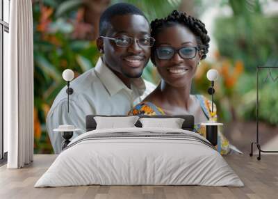 Beautiful young couple wearing stylish eyeglasses, smiling happily together. Wall mural