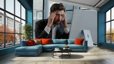 Caucasian bearded 40s middle-aged businessman worker employee man typing laptop feel failure upset with lost of information online error stressed look at computer screen suffer from headache pressure Wall mural