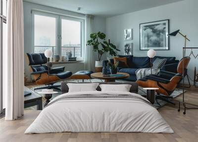 cozy and minimalist living room with a modern Scandinavian interior featuring a dark blue sofa and recliner chair. Wall mural