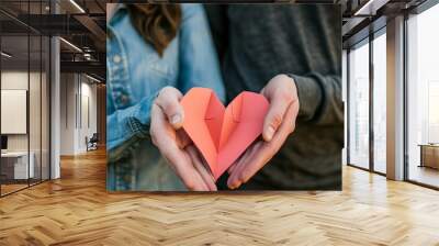 Diverse couple holding folded heart red paper Valentines day kissing kiss love care celebration gift valentine decoration honeymoon relationship passion romance romantic colours pink hearts holiday Wall mural