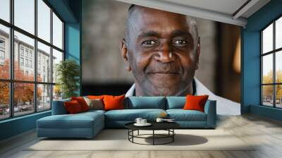 Elderly male portrait indoors of african american adult 50s man biracial senior businessman confident handsome mature grandfather bachelor middle-aged customer parent wrinkled face looking at camera Wall mural