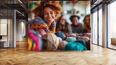 Group of people doing needlework knitting. Yarn and soft wool in various colors and textures are scattered around them. Wall mural