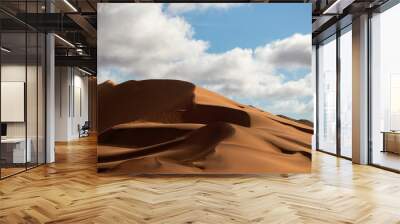 Golden sand dune 7 and white clouds on a sunny day in the Namib desert. Fantastic place for travelers Wall mural