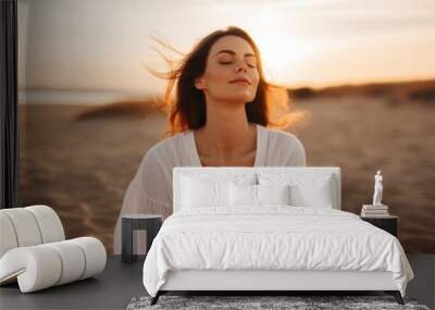 Portrait gorgeous charming relaxed European woman lady girl female sitting performing meditation beach sand ocean sea. Vacation trip mental health care happy traveler holiday soul rest wellness yoga Wall mural