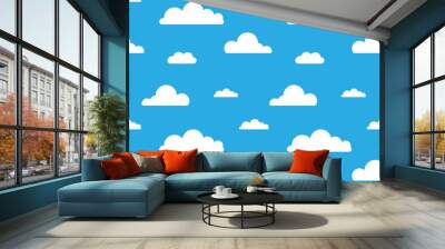 Seamless vector pattern with clouds on blue background. Cartoon modern white clouds in flat design isolated. Design for web page backgrounds, fabric, wallpaper, textile and decor Wall mural