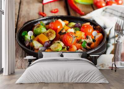 roasted vegetables in a cast iron pan Wall mural