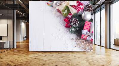 Christmas background with gift boxs, christmas tree, mittens and decorations Wall mural